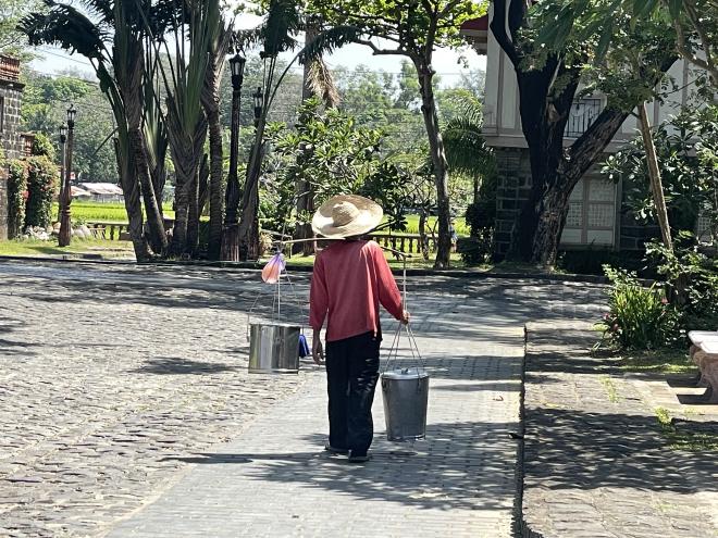 someone is selling Taho at Las Casas Filipinas de Acuzar