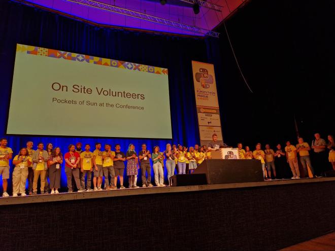 our volunteers are pocket of sun at the conference